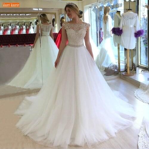 Sparkly Crystal Wedding Dress Lace Appliqued Beaded Pearls Sexy Sleeveless Bridal Gowns Long 2020 Vestidos De Novia Custom Made