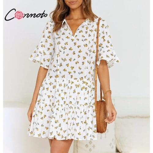 Conmoto Elegant short beach picnic dresses Lace up v-neck yellow bright floral print dress Holiday vacation summer dress 2021