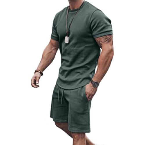 Tracksuit men summer suit Solid Color Drawstring Men Loose Short Sleeve T-shirt Pocket Shorts for Fitness men Clothing xxxl