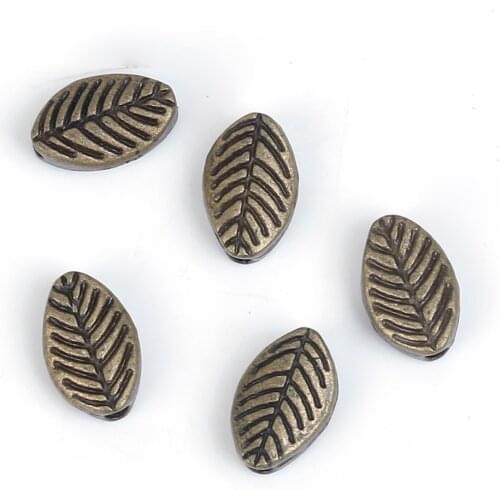 DoreenBeads Zinc Based Alloy Antique Bronze Spacer Beads Leaf DIY Findings 9mm( 3/8") x 6mm( 2/8"), Hole: Approx 1.5mm, 100 PCs