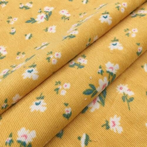 Half meter yellow fresh little flower print cotton corduroy fabric for dress shirt children garment T706