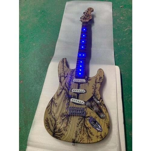 Free delivery / burnt pattern log LED light Wilkinson pickup high end Guitar / China Electric Guitar