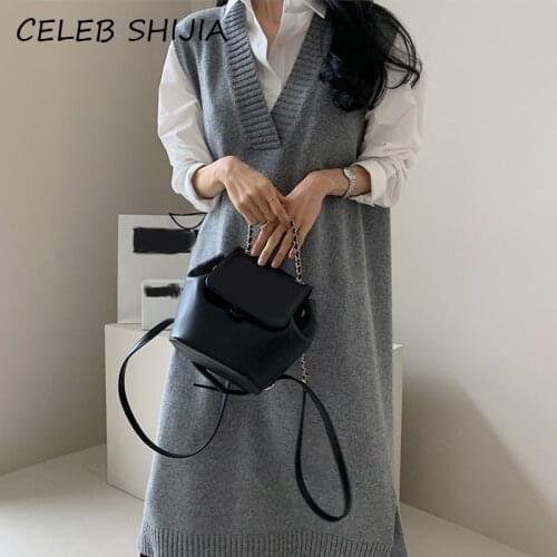 SHIJIA New Chic V-neck Sleeveless Knitted Dress Female Elegant Loose Solid Long Sweater Dress Woman Autumn Pullover Winter 2021