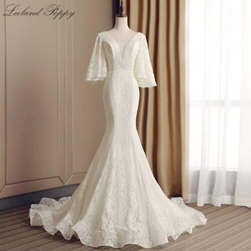 Lceland Poppy Mermaid Lace Wedding Dresses 2020 V-neck Flare Sleeves Floor Length Bridal Gowns V-Backless Court Train