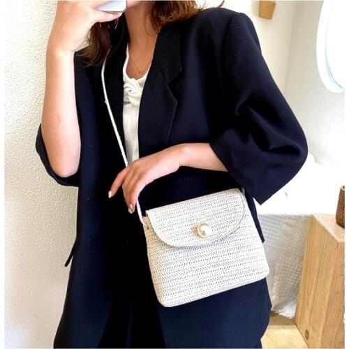 New 2020 Korean pearl woven bag womens Bohemian style cross woven beach small square bag, pure hand woven messenger bag