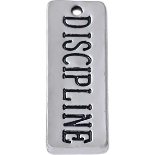 The fashion metal pendant with double sided carving DISCIPLINE charms