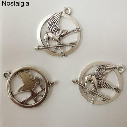 Nostalgia 20Pcs The Hunger Games Ridicule Bird Charms Movie Jewelry Pendant 28*29MM