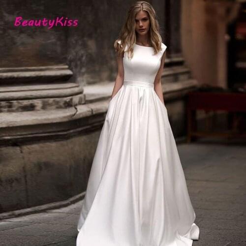 2020 Sexy Backless Satin Wedding Dresses With Pocket Sleeveless Bridal Gowns Floor Length Wedding Gowns Vestido de novia