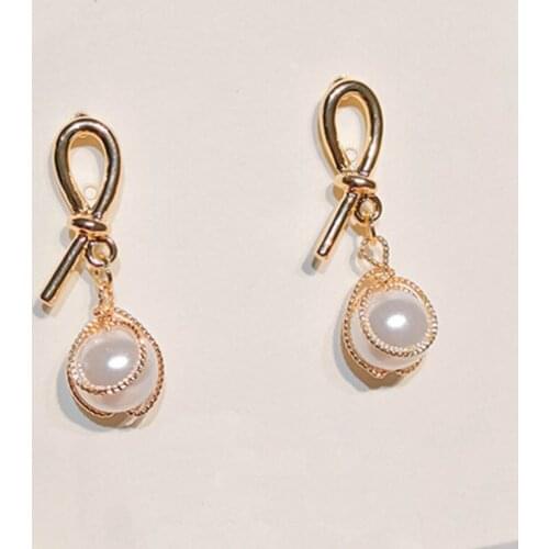 2021 Sale Rushed Tin Alloy Spike Brincos Oorbellen Needle South Net Tie Fashionable And Versatile Pearl Earrings Women Brinco