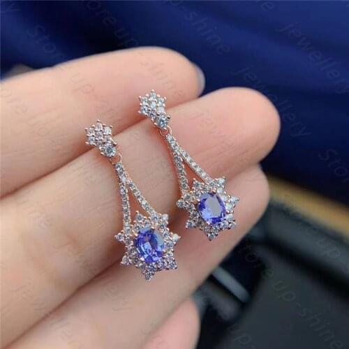 The new 925 silver inlaid natural tanzanite earrings are simple and elegant, gem size 4*5mm