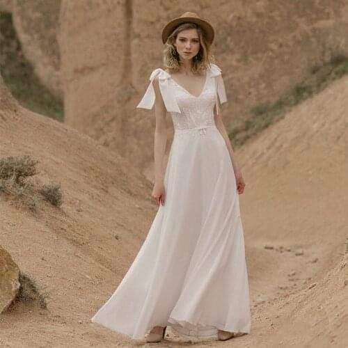 Simple A-Line V-Neck Wedding Dresses 2021 Lace Appliques Sleeveless Bow Chiffon Cheap Bridal Gown Floor Length Blackless
