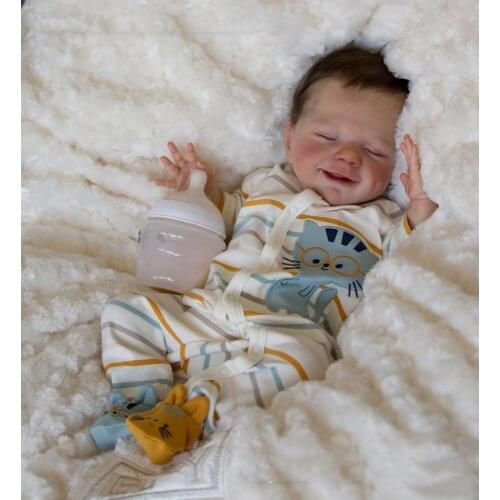 Popular reborn doll kit sleeping April smiley face very soft touch fresh color unpainted unfinished doll parts DIY