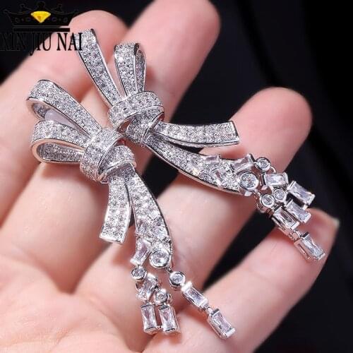 Hot selling new European and American super flash zircon bow tassel pendant long temperament silver needle crystal earrings