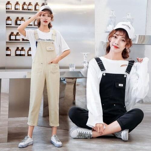 Net red girlfriends wear bib pants female nine points pants Korean version of the age reduction wild loose wide leg jumpsuit