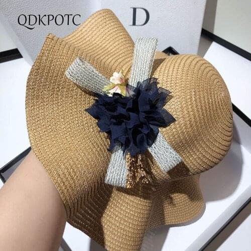 2021 Hat New Summer Women Straw Wavy Edge Sun Hats Bohemian Sandy Fashion Flowers Beach Sun Protection Shading Straw Cap QDKPOTC