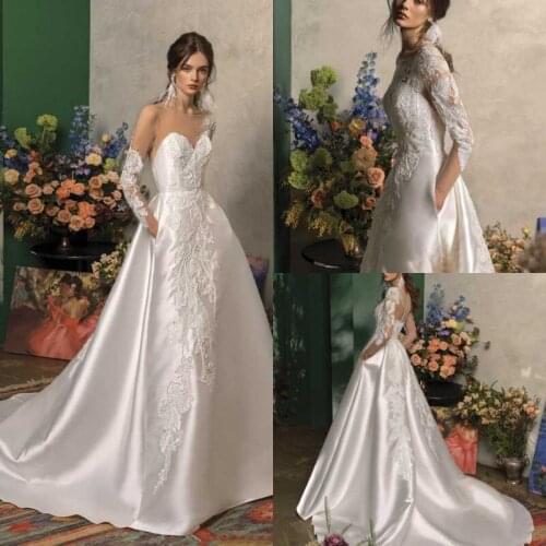 2021 Wedding Dresses Long Sleeves Lace Appliques Beads Bridal Gowns Gorgeous Button Back Sweep Train A Line Wedding Dress