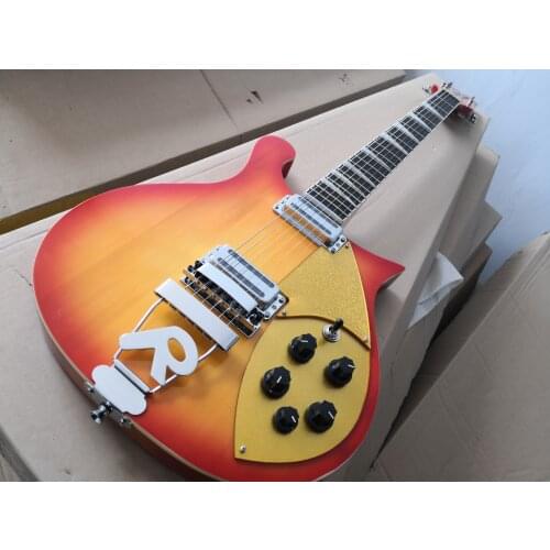 Custom 360 6 string guitar,tremolo bridge ,cherry sunburst body,5 switch ,chrome hardware,golden pickguard