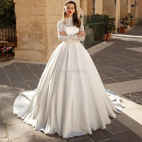 Charming Ball Gown Satin Wedding Dresses 2020 Exquisite Lace Applique High Neck Long Sleeve Formal Bride Gowns with Beaded Sash