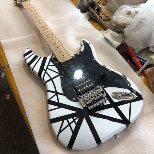 High quality 6 electric guitar, black stripes, white paint, maple neck, bright fingerboard, double rocking guitar, including fre