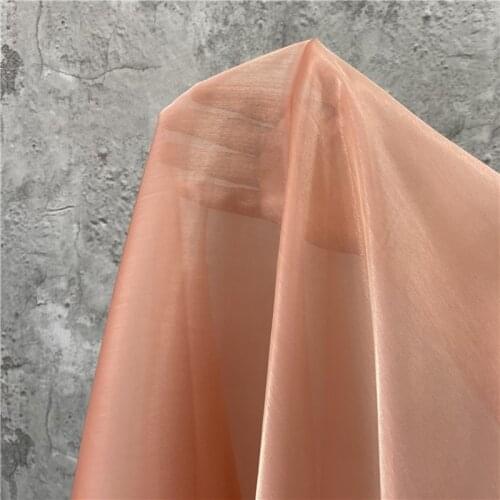 Orange Pink Organza crystal lustrous feeling encryption smooth modeling mesh cloth gift clothing design fabric high quality