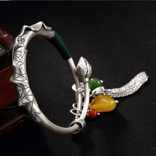 S990 foot silver retro lotus lotus lotus tassel and tian jasper beeswax zodiac lady push-pull silver bracelet