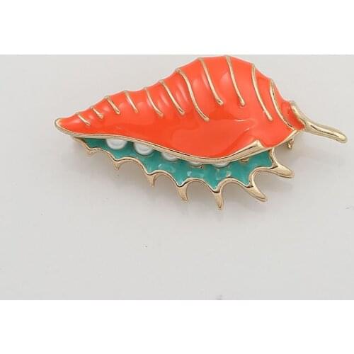 Enamel glaze drops pearl shell fine alloy new winter sweater cardigan coat dust coat fashionable joker brooch