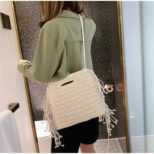 Cotton Woven Hand Held Fringed Beach Straw Bag High Quality Designer Holiday Handbags for Women 2021