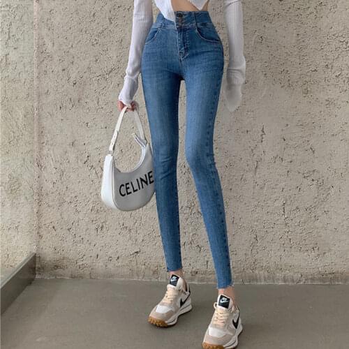 Spot Chinese autumn new womens pants personality back waist label stretch high waist small leg jeans