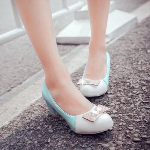Oversized ladies high heels women shoes woman pumps Metal decoration of round head, shallow mouth and thick heel socket