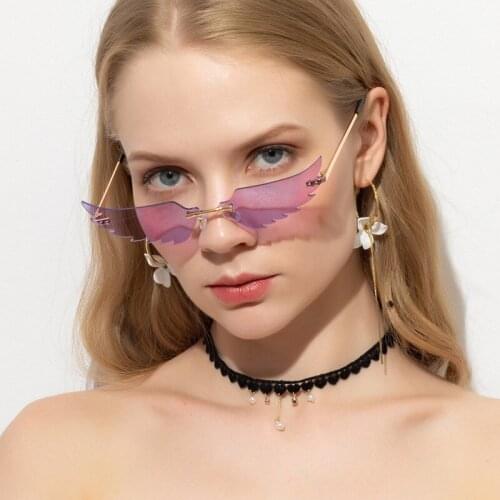 TEENYOUN Rimless Angel wings Sunglasses Brand design For Party Women Men Unique Frameless Hollow out Sun Glasses Cool Shades
