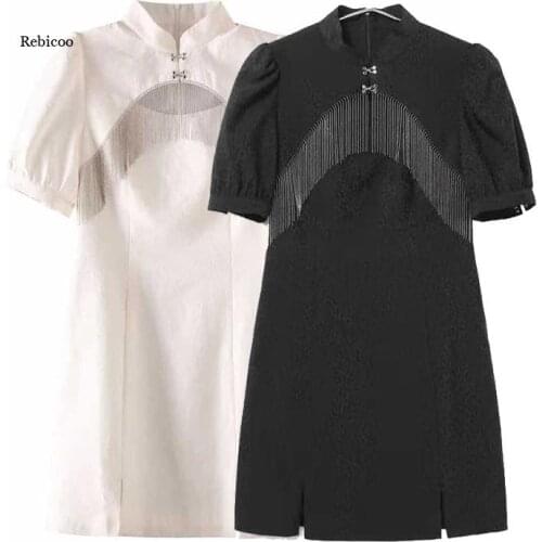 Spring/Summer New Womens Round Neck Irregular Tassel Stitching Hollow Short Sleeve Top