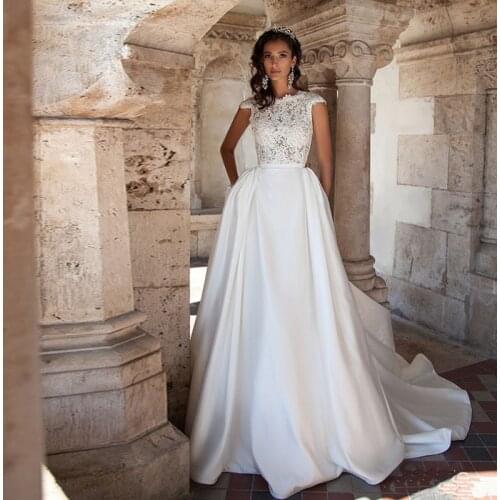 Sexy Backless Lace Wedding Dress Cap Sleeve Lace Vestido De Novia Plus Size Princess Bridal Dresses Sweep Train Robe De Mariee