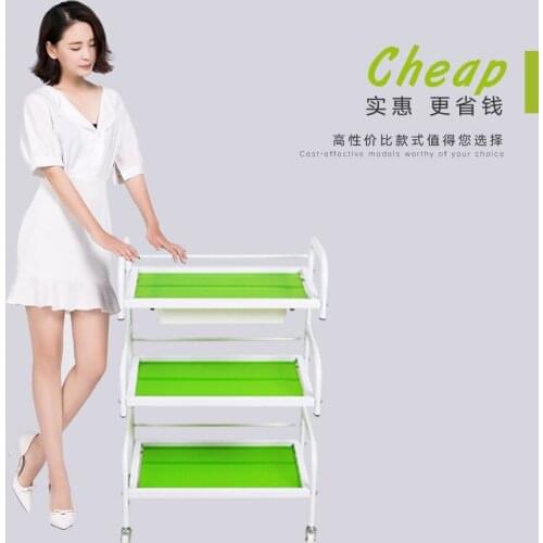 Beauty salon trolley. Three layers with drawer hairdressing salon trolley. The barbershop van ark