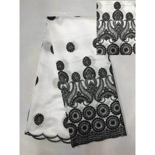White color African lace fabric 2017 with black sequins/hot sales Nigerian George lace fabric for sewing fashion dress
