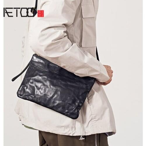 AETOO Leather messenger bag, mens lightweight and trendy shoulder bag, versatile and versatile mens chest bag