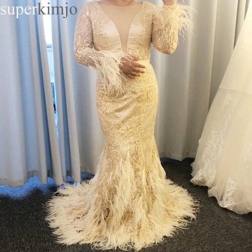 Champagne prom dresses 2019 long sleeve feather beading sequins mermaid floor length evening dresses arabic