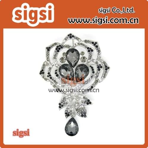 Temperamental rhinestone brooch