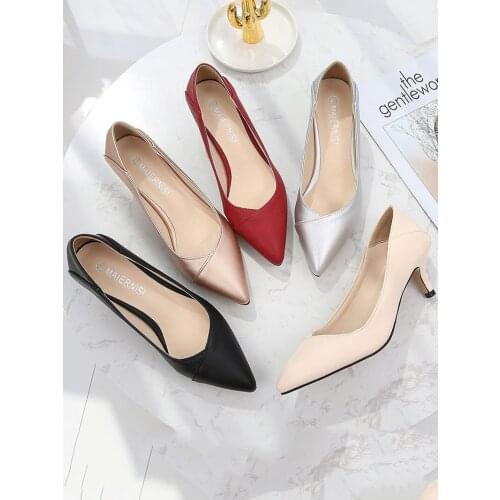 NKUSKAD Leather Pumps