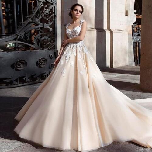 2021 Champagne Lace Wedding Dresses Sheer Jewel Neck Sleeveless Applique Cathedral Train Bridal Gowns robe de mariee