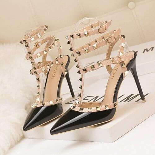 New Summer Roman fashion rivet sandals 10CM PUMPS Woman shoes Sexy nightclub stiletto heels patent-leather metallic rivet hollow