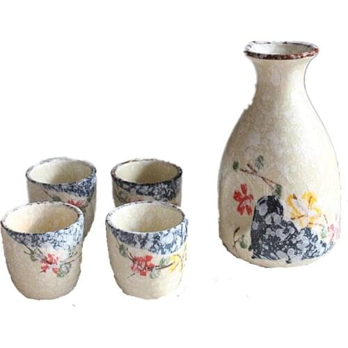 Hand-painted ceramic flagon with glass flagon