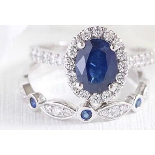 Hot-Selling Ornament Egg-Shaped Sapphire Blue Gem Inlaid White Diamond Female Ring Set