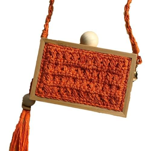 Spring and summer 2021 new wooden rack straw bag spot tassel ball head handbag slant bag female holiday beach bag
