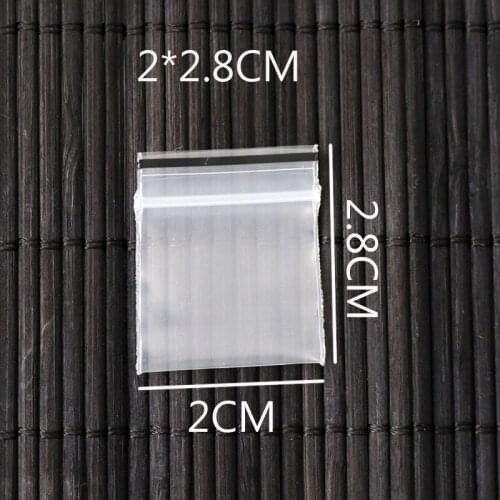 100Pcs 2cmx2.8cm /0.78inch x 1.1inch Transparent Jewelry Pill Pearl Powder Hermetic Bag Zip Lock Plastic Gift Packaging Bags