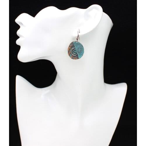 Two-color irregular round spiral fashion simple retro earrings are suitable as a gift to friends and family to play with clothes