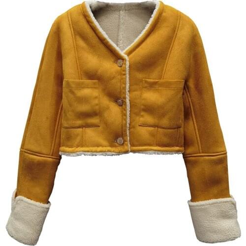 The new lambs wool V-neck jacket short wool and fur one-piece roll-sleeved yellow fashion jacket women