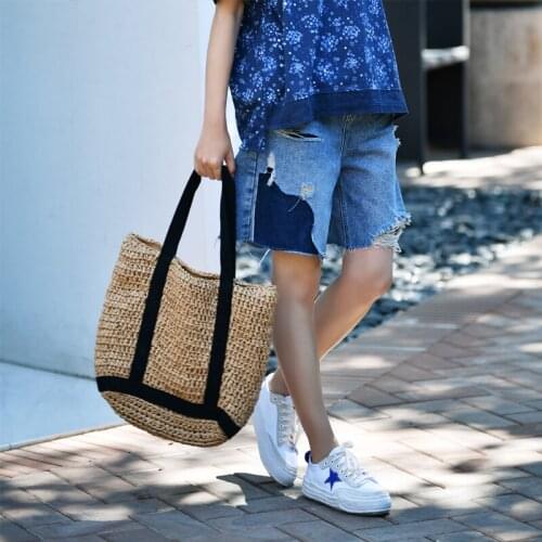 MICOCO N8825 Korean version broken hole spell color rough edge casual foreign style versatile denim shorts women