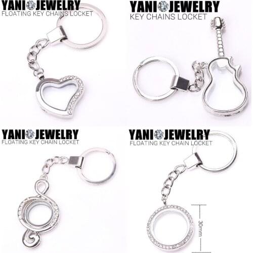 10pcs/lot Free shipping Round Silver Memory Living Magnet Glass Floating Locket Pendant Key Ring Keychains Locket