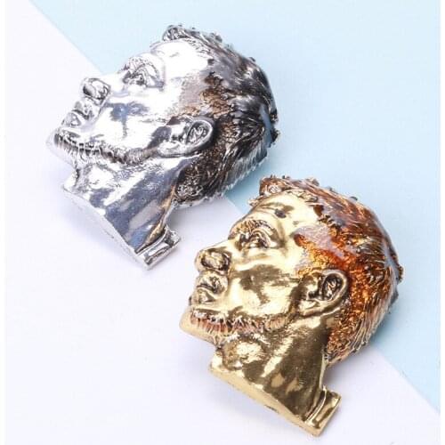 Manufacturers selling retro metal drip male head pin brooch temperament joker coat clothing accessories wholesale