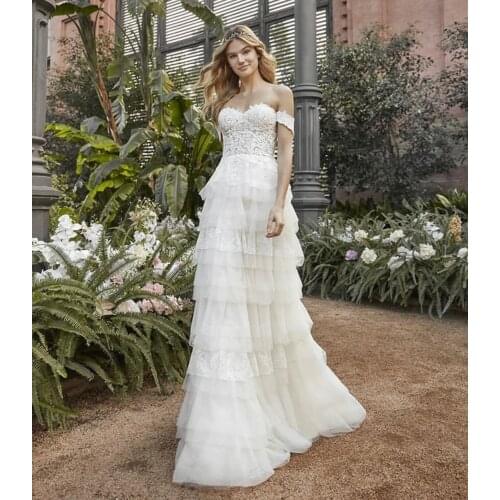 Boho Wedding Dress A-Line Sweetheart Off Shoulder Tiered Lace Appliques Sequined Backless Floor Length Sweep Train Bride Gown